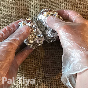 Gluing two popcorn shaped tinfoil balls